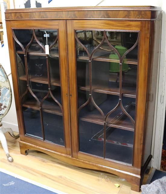 A mahogany glazed low bookcase W.124cm